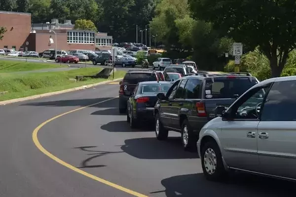 The Perplexing Phenomenon of Protracted School Pick-Up Queues