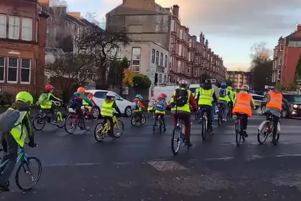 Driver's Outcry Against Cycling Schoolchildren Sparks Community Support for 'Bike Bus' Initiative