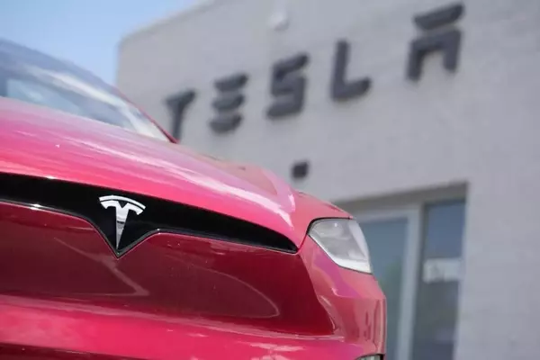 Tesla's Shifting Strategy: From EV Leader to AI and Robotics Pioneer Amidst Profit Slump