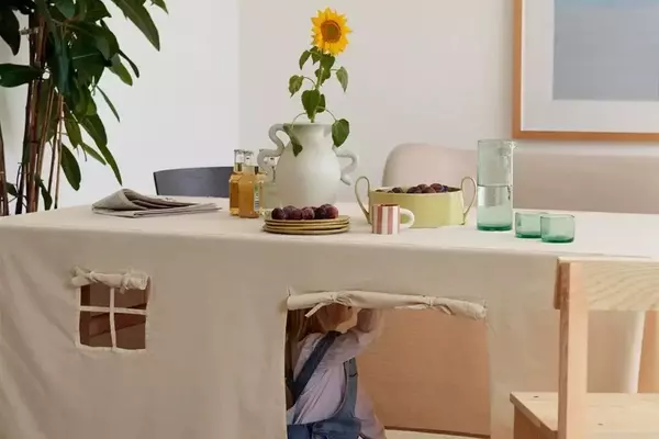 Crafting Whimsical Worlds: The DIY Tablecloth Playhouse