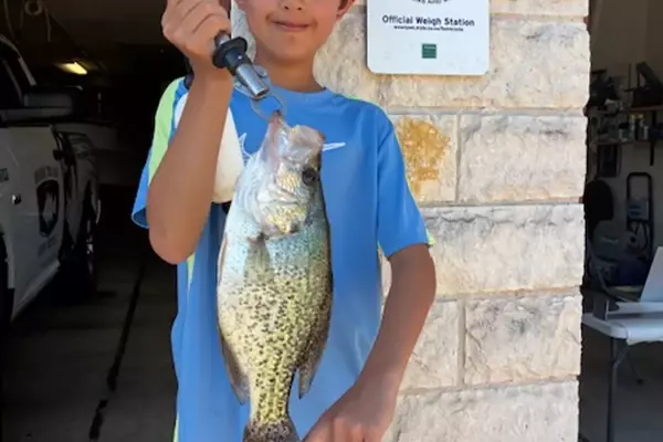 Young Angler Catches Potential Record-Breaking Crappie