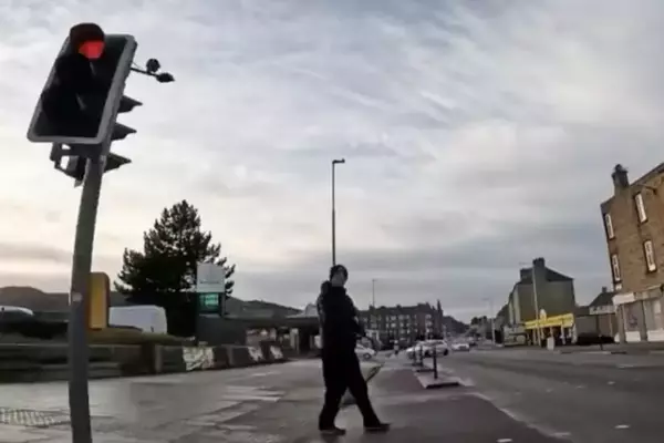 Cyclist's Red Light Incident Goes Viral, Sparks Online Debate