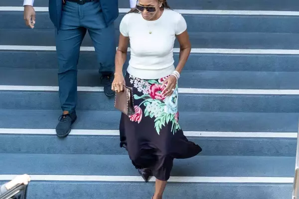 Michelle Obama Redefines Professional Attire with Chic Slip Skirt Ensemble