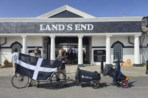 Cyclists Undertake Epic Journey, Towing Bins to Clean Up Britain