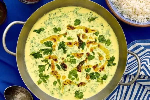 Crafting Kadhi: A Tangy and Flavorful Chickpea-Yogurt Stew