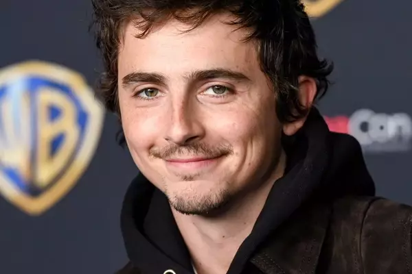 Timothée Chalamet's Hair Evolution: From Buzz Cut to Knicks Game Style