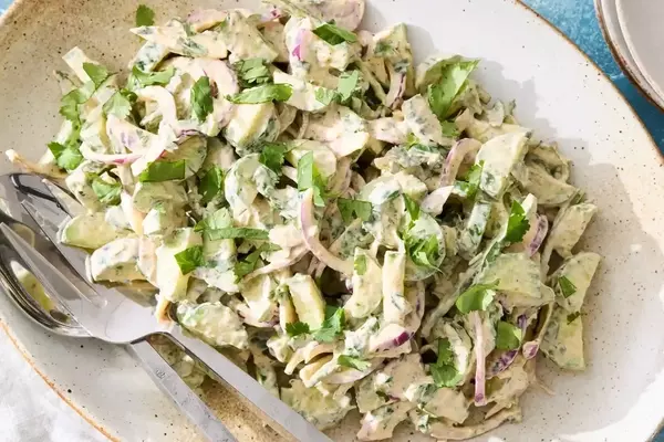 Refreshing Cucumber Salad with Spicy Yogurt Dressing: A Culinary Journey from Childhood Snacks