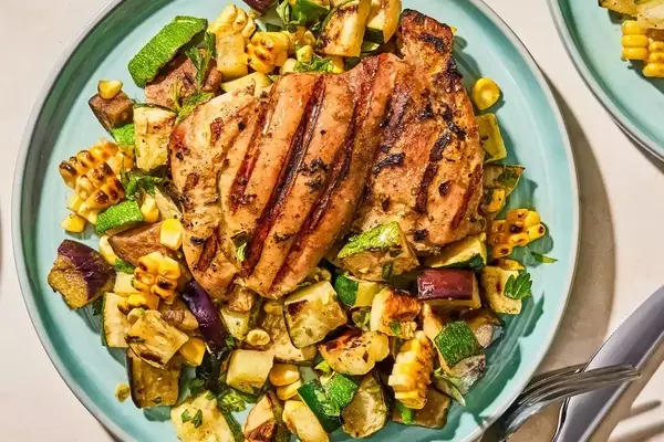 Flavorful Herb-Marinated Chicken Thighs with Grilled Vegetable Medley