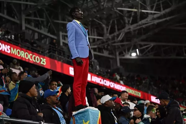 The Silent Fan: Michel Kuka Mboladinga's Unique Tribute to Congolese History at the World Cup