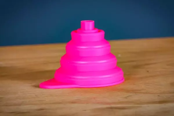Muc-Off Collapsible Silicone Funnel Review: An Eco-Friendly Essential for Cyclists