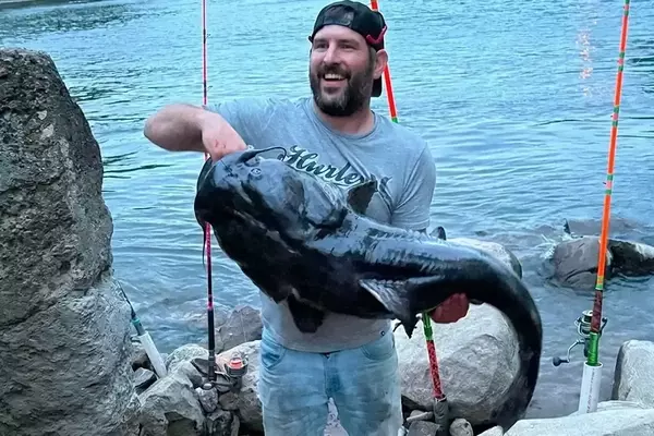 Michigan Angler Reels In Giant Flathead Catfish