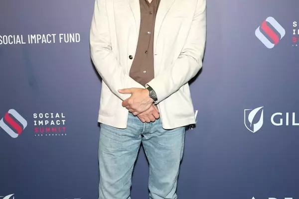 John Mayer's Summer Blazer Style Echoes Eric Clapton